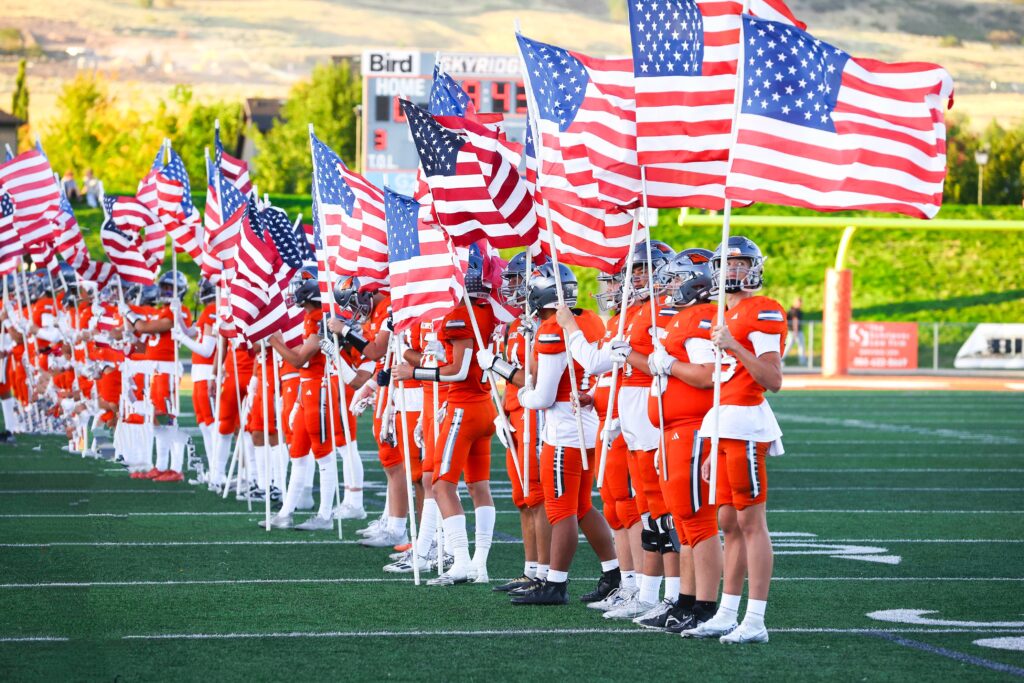 Skyridge football team honors America